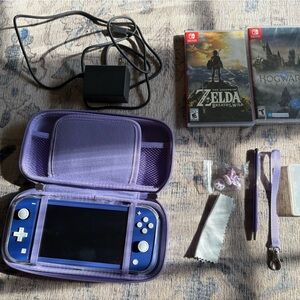 Nintendo Lite Blue Complete Bundle Barely Used with Legend of Zelda & Hogwarts